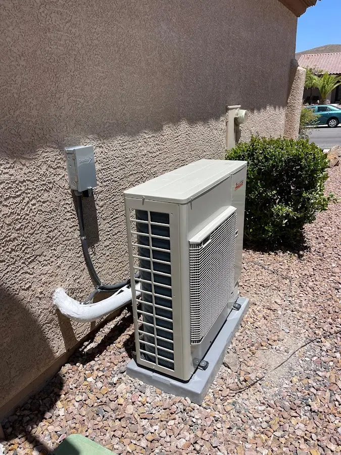 Residential air conditioning condenser unit in Fredonia